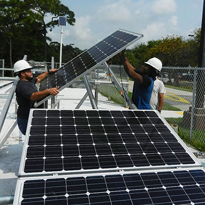 Students working with solar panels